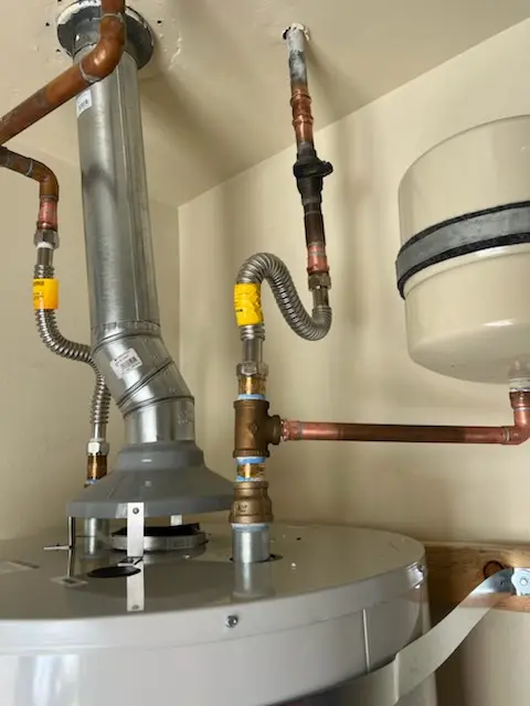 Water heater installation and plumbing repair in Jacaranda West